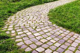 Charming cobblestone paving, evoking a sense of history and character in any outdoor setting.